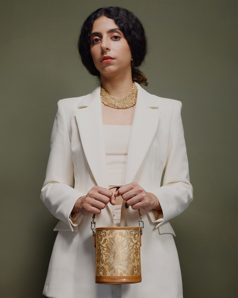 Imperial Gold Brocade Barrel Potli by TAN AND LOOM
