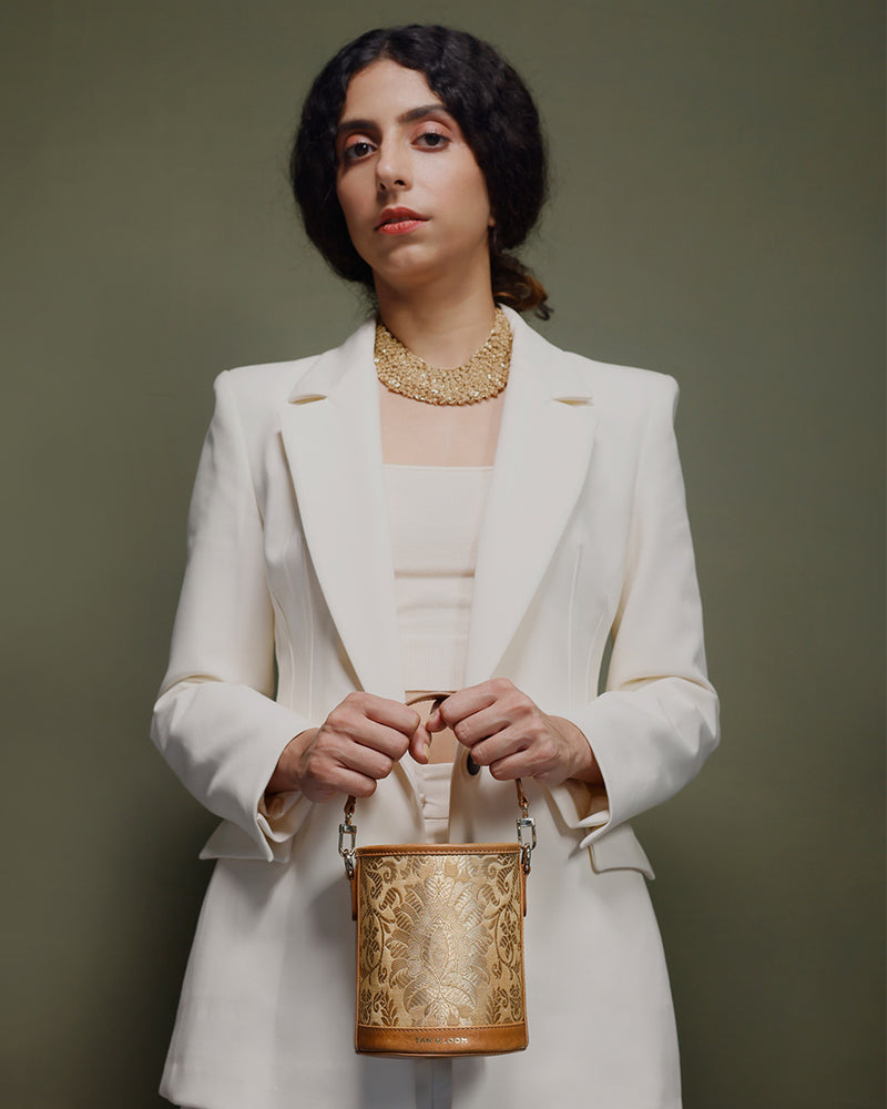 Imperial Gold Brocade Barrel Potli by TAN AND LOOM