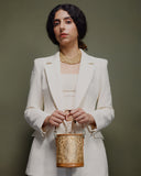 Imperial Gold Brocade Barrel Potli by TAN AND LOOM