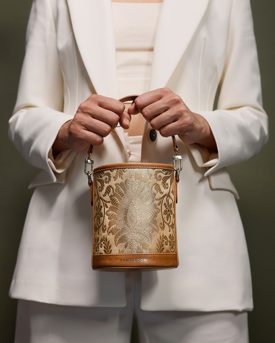 Imperial Gold Brocade Barrel Potli by TAN AND LOOM