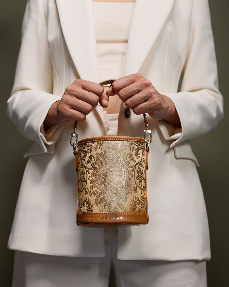 Imperial Gold Brocade Barrel Potli by TAN AND LOOM