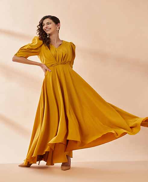Mustard Angel Sleeve Gown by AAKAAR