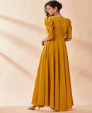 Mustard Angel Sleeve Gown by AAKAAR