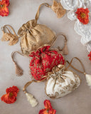 Stunning Royal Potli Bag in Pure Silk with Pearl Embroidery and Cutdana Tassels