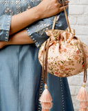 AMYRA Peach Floral Creeper Potli Bag