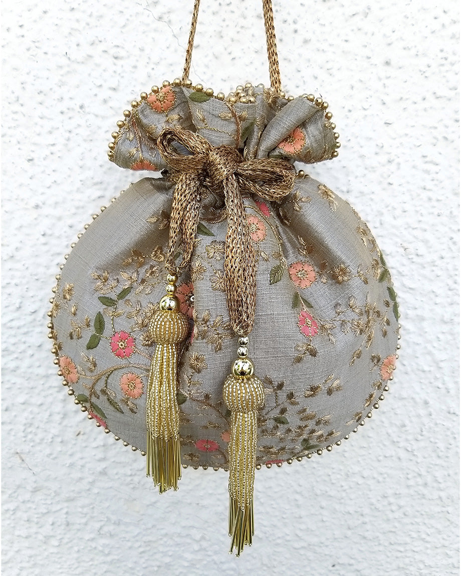 Grey Floral Creeper Potli Bag by AMYRA