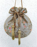 Grey Floral Creeper Potli Bag by AMYRA