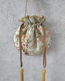 Mint Floral Creeper Potli Bag by AMYRA