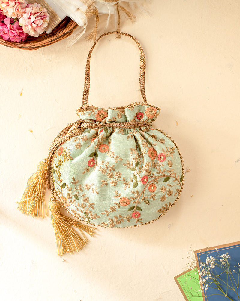 Mint Floral Creeper Potli Bag by AMYRA