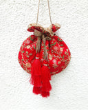 Red Floral Creeper Potli Bag by AMYRA