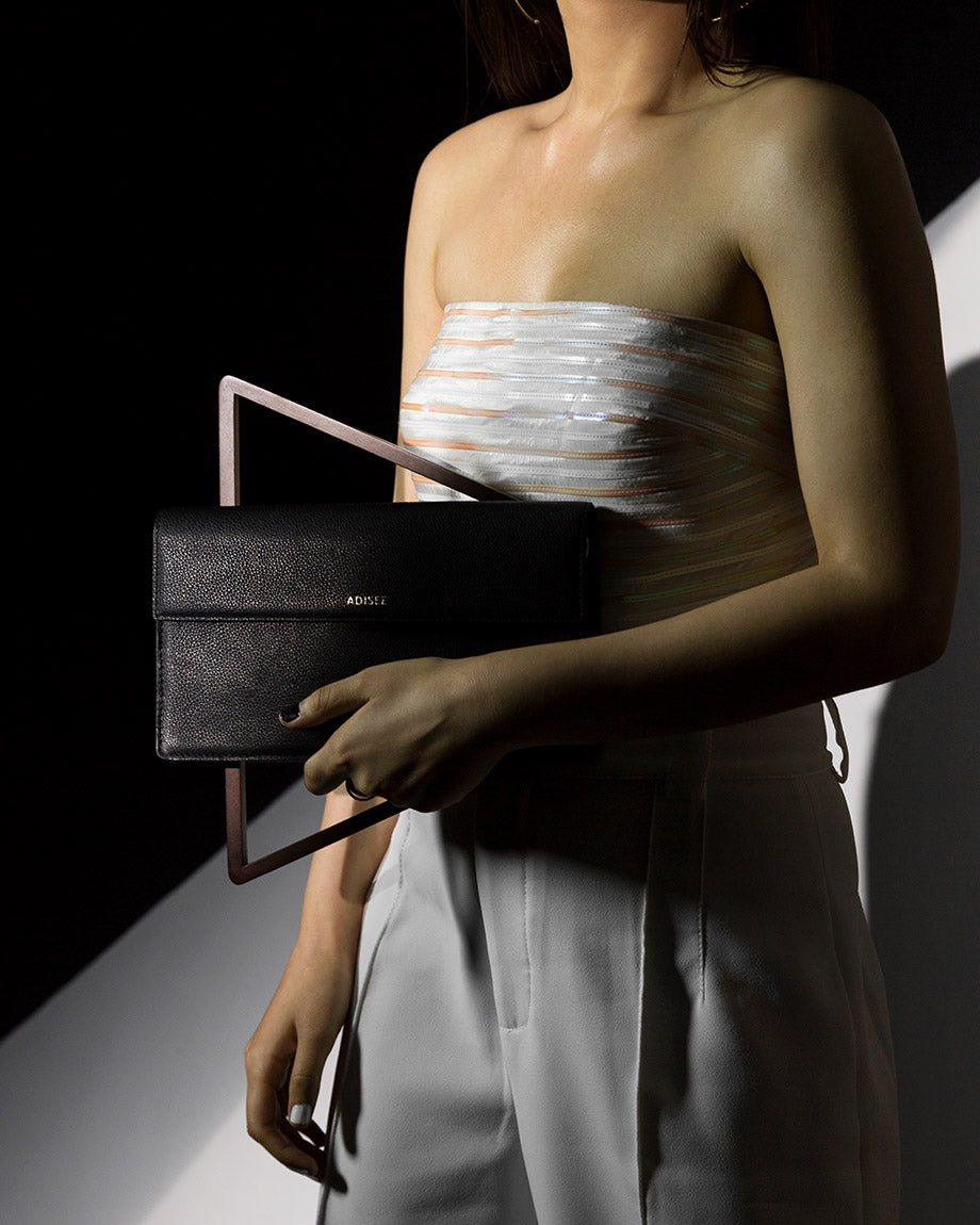 "Shop the Versatile Joane Black Leather Bag with Removable Wooden Handle and Crossbody Strap "