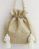 Beige Oyster Potli Bag by AMYRA