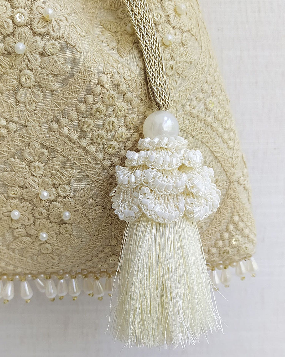 Beige Oyster Potli Bag by AMYRA