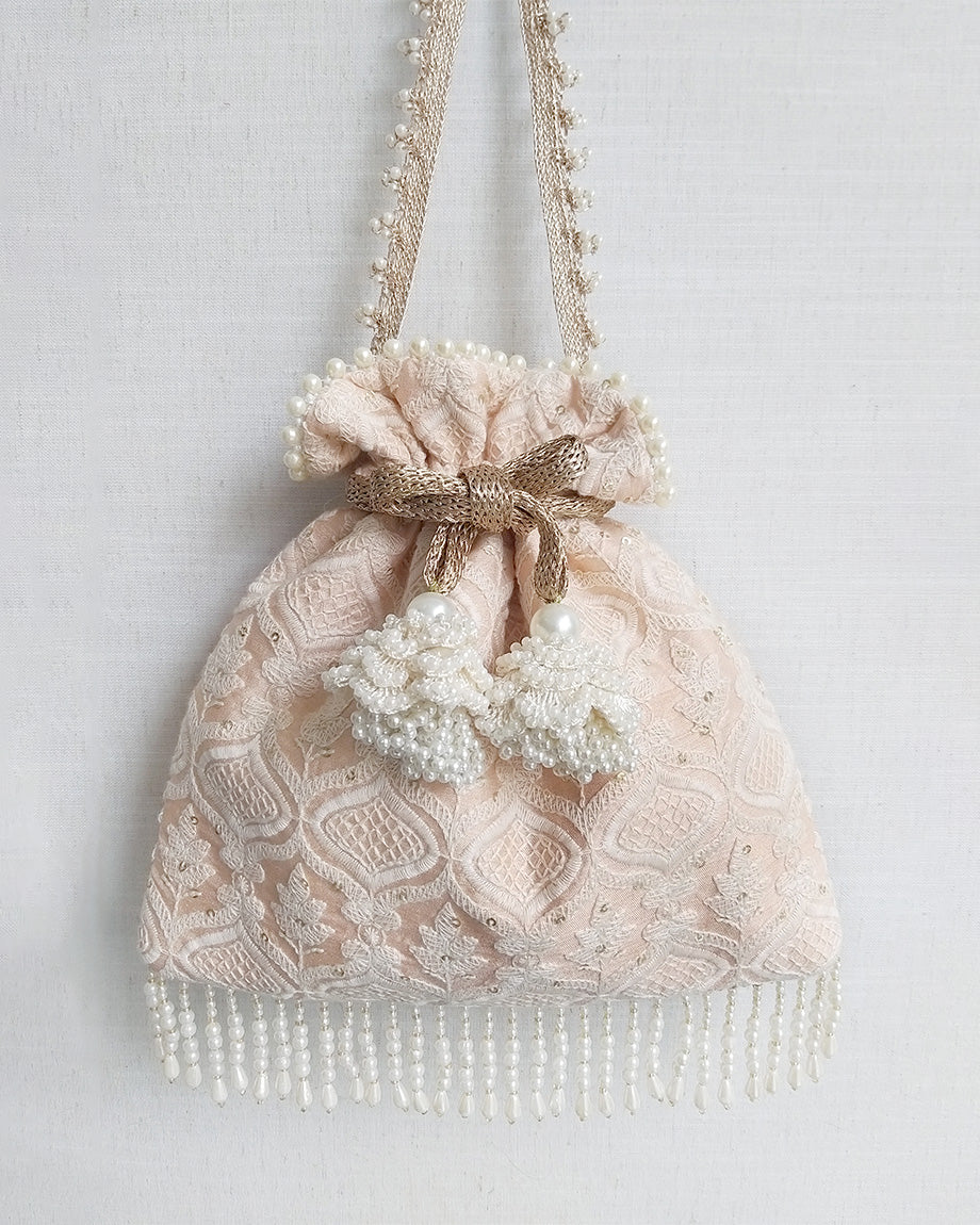 Peach Khwaab Potli Bag by AMYRA