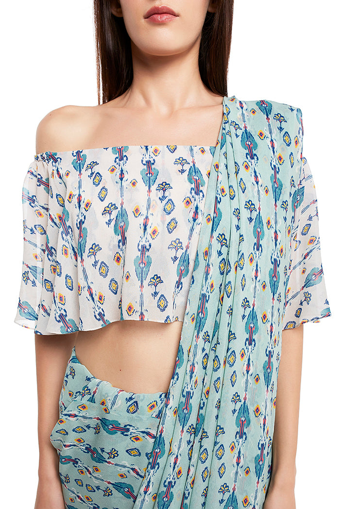 Front View of White and Blue Ikat Line Print Georgette Off Shoulder Top and Saree Set