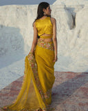 Mustard Cutwork saree and blouse set by PAULMI AND HARSH