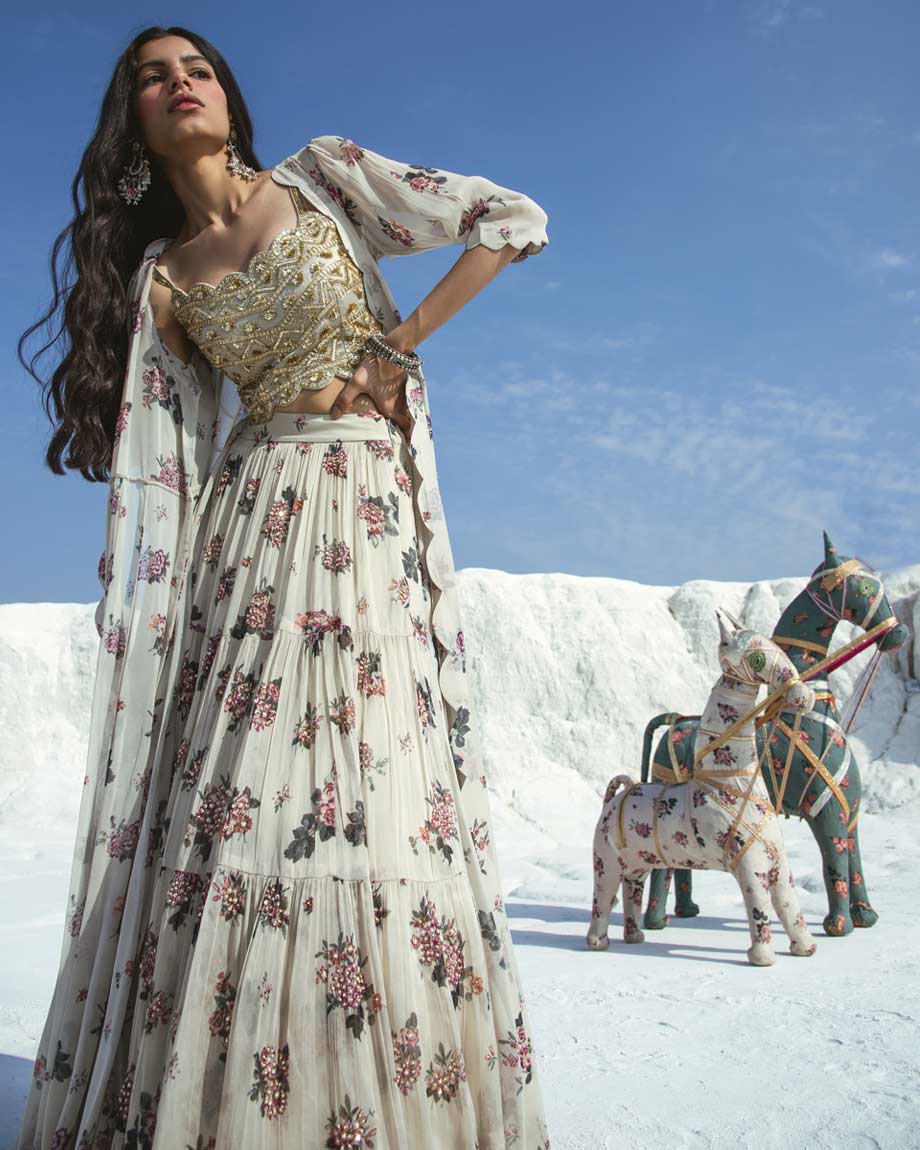 Off White Lahenga Set with a Jacket by PAULMI AND HARSH