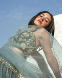 Green embroidery lehangha Set by PAULMI AND HARSH