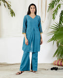 Chic broderie anglaise tunic attire 